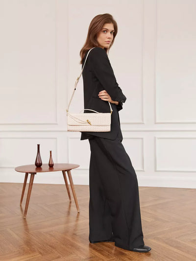 The Tessuta Woven Clutch Bag