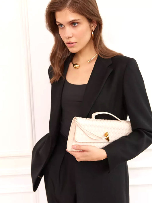 The Tessuta Woven Clutch Bag